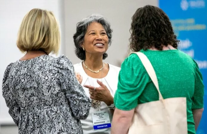 People talking at event