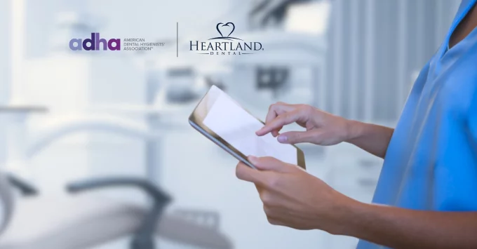 AI Knowledge in Dentistry. Healthcare professional holding an tablet in the operatory.