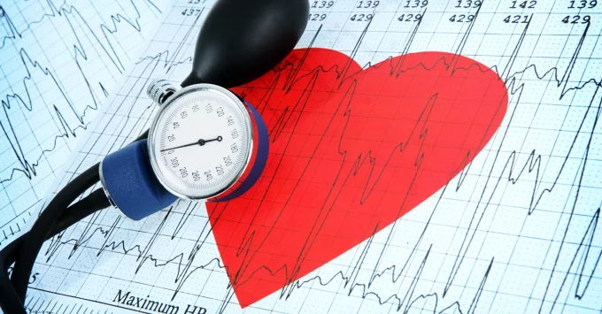 Stethoscope with medical chart and heart graphic