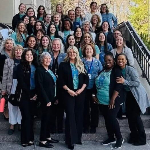 A group of 40 dental hygienists gathered on the stairs of the Nevada state capitol building in Carson City.