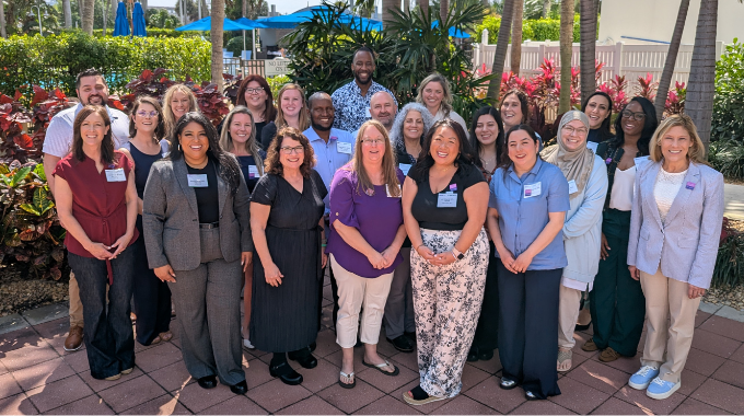 Group of hygienists standing on a patio smiling