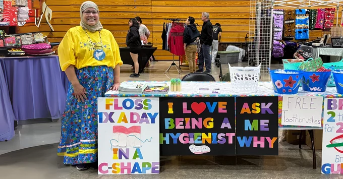 Kelly Farran, RDH at health fair booth