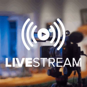 Live Stream - A camera filming a lit stage