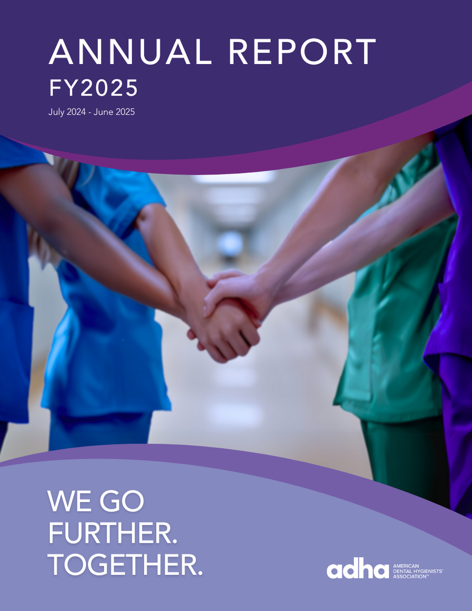 Cover of the FY2025 ADHA Annual Report. 4 hygienists shown from the neck to the thigh in scrubs, placing one hand in the center and holding hands