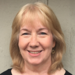 Lisa Rowley smiling in black top