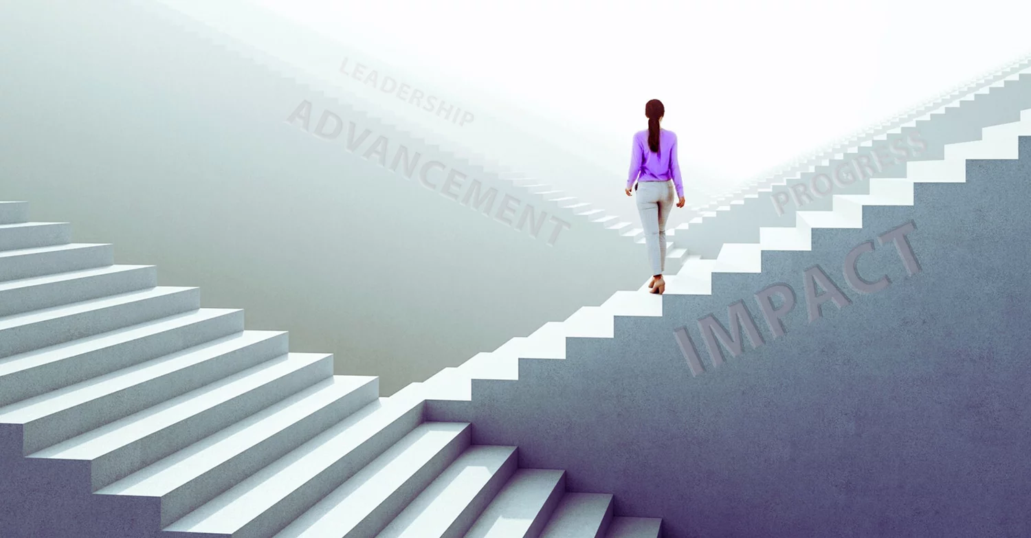 Woman in purple top stands among stairway options with inspirational messages