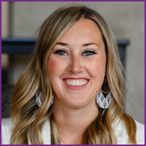 Alyssa Aberle headshot, cream jacket, smiling