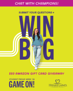 Female in sweater and jeans with long brown hair in front of WIN BIG for Student Proud Week 2026