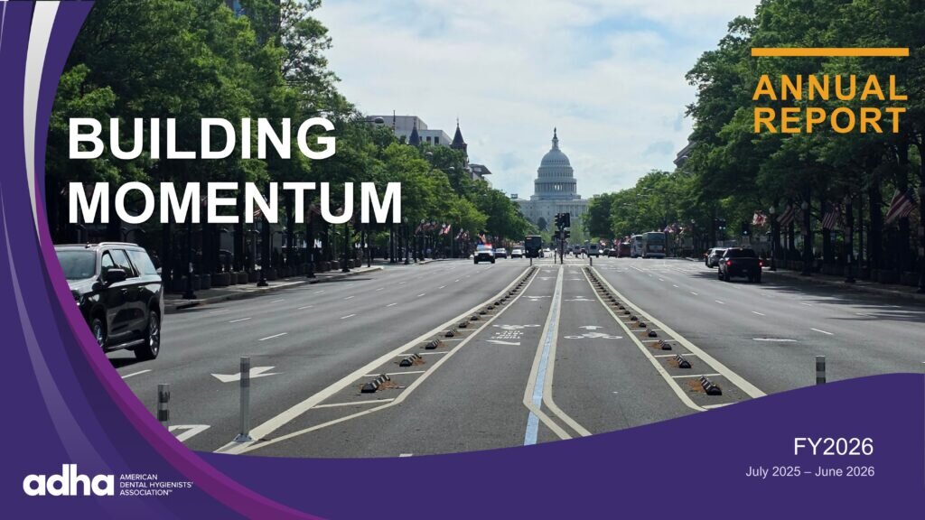 Cover of the FY26 Annual Report, "Building Momentum" with a view of the street leading to the Capitol in Washington DC