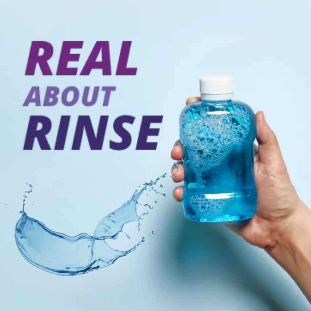 Real about rinse. A hand holding a bottle of blue mouthrinse beside a splash of liquid.