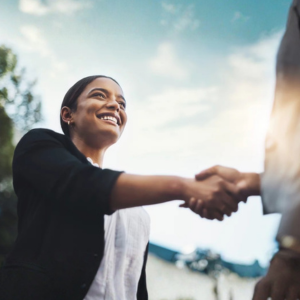 Two professionals shaking hands